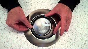 To replace the old recessed lights spring clips that won't hold, hook the new recessed lighting spring clips into the small openings along the edge of the trim. How To Install A Recessed Eyeball Trim By Total Recessed Lighting Youtube