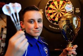 Teen darts champ Maison Wilson threw his first arrow when he was just 18  months old