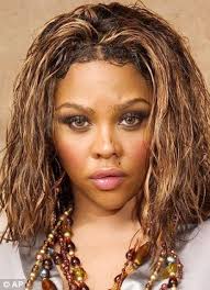 What has happened to Lil' Kim's face? Rapper sparks concern with puffy  facial features and altered lips