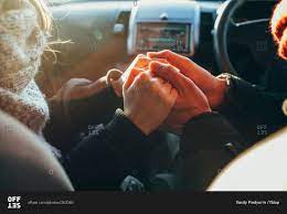 I hope you guys enjoy my videos i like gaming. Couple Holding Hands In Car Stock Photo Offset