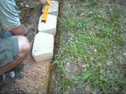 When installed correctly, landscaping structures built with concrete block can last for decades with minimal upkeep. Building A Concrete Block Retention Wall Youtube