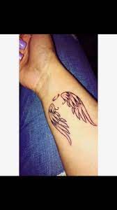 Guardian Angel Small Wrist Tattoo Rip Uncle Dan Small Wrist Tattoos Angel Tattoo For Women Angel Tattoo Designs