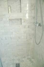Should You Tile A Bathroom Floor Or Wall First In 2020 White Marble Bathrooms Marble Tile Bathroom Bathrooms Remodel