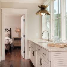 Whether you want a modern wet bar or a rustic wet bar, we have tons of inspiration for your wet bar design. Hallway Wet Bar With Lotus Chandelier Cottage Bedroom