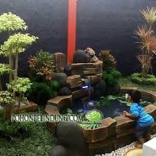 Nah, supaya tampilan eksterior rumah lebih impresif, kamu bisa meniru sejumlah inspirasi desain kolam ikan minimalis batu alam berikut ini. Harga Pembuatan Taman Tebing Relief Batu Alam