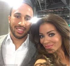 Andros Townsend poses with girlfriend Hazel O'Sulivan, as Tottenham winger  enjoys an evening at the darts