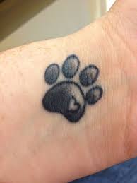 Pin By Qwen On Tattoo Inspiration Cat Paw Print Tattoo Print Tattoos Pawprint Tattoo