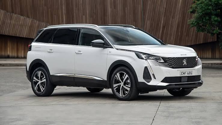 Factory condition 2021 Peugeot 5008 (P87 Facelift) featuring signature LED fang headlights., AI generated