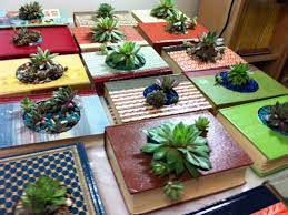 I have some mini planters and succulents in my craft room. Make A Succulent Planter From Vintage Books Hgtv