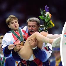 Nassar assists kerri strug during the 1996 olympics. Women In Sports 15 Iconic Images In Women Sport Sportzpoint
