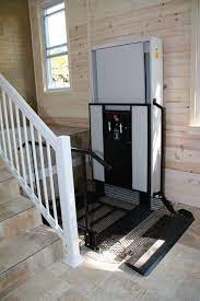 This Porch Lift Is Attractive And Is A Very Efficient Use Of Space This Vertical Platform Lift Is Easy Second Bedroom Ideas Wheelchair Accessories Lift Design