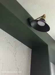 Even though these light fixtures don't require wiring, you still want to do some research into their setup process. How To Add A Light Fixture Anywhere Without Electricity From Thrifty Decor Chick