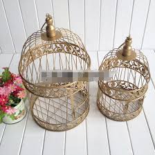 Wholesale birdcage frame decor super wholesaler. Hot Gold Bird Cage Decoration Hand Made Candle Lantern Vintage Metal Candle Bird Cages Moroccan Lanterns Wedding Decor 2017 New Buy At The Price Of 11 15 In Aliexpress Com Imall Com