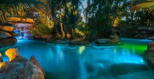 Panorama Of Lagoon Pool At Night Lagoon Pool Pool At Night Pool Water Features