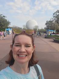 How to add more people to the background of a photo taken at Epcot?