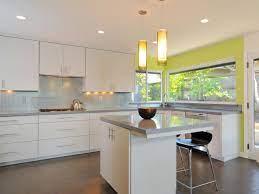 This chic and inviting kitchen by alys design combines a cozy dining space with custom cabinetry. Modern Kitchen Cabinets Pictures Options Tips Ideas Hgtv