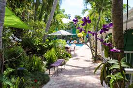Property features include a serene pool courtyard with waterfalls and. Almond Tree Inn Key West
