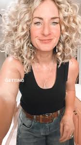 Getting dressed over here! Here are all the details , Barrel jeans, free  people. , Tank, Target. , Sweater, thrifted (brand is Kirundo), Sandals,  Boden. , Bag, ClareV. , Lipstick, syrup by MAC, Belt, ...