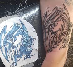 Blue eyes white dragon tattoo. Wizarding Tattoo Explore Tumblr Posts And Blogs Tumgir