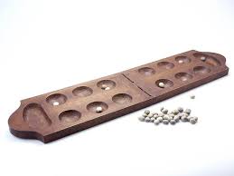 File Tropenmuseum Royal Tropical Institute Objectnumber 699 2 Speelbord Voor Mancala Spel Jpg Wikimedia Commons