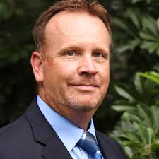 Preventing screws from backing out in rub rail?