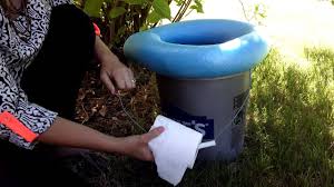 When you set up your toilet at a new campsite, fill it with a trash bag to make bucket cleanup easier. Camping Hacks Diy 5 Gallon Bucket Toilet Youtube