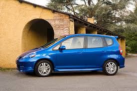 The first new color, sirius blue, will only be available. 2007 Honda Fit 5dr Sport Blue 3 4 Side View On Pavement By Building Kimballstock