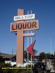 A Vintage Drive Through Storefront Sign From The 1950 S Now It S A Liquor Store Go Figure Storefront Signs Vintage Store Displays Shop Signage
