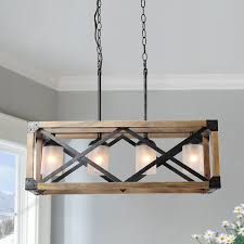 The right lighting can make all the difference, and with help from lowe's, it's easy to craft the perfect lighting experience for each room in your home. Lnc Laius 4 Light Antique Black Farmhouse Chandelier Lowes Com Farmhouse Light Fixtures Dining Room Chandelier Dining Room Lighting