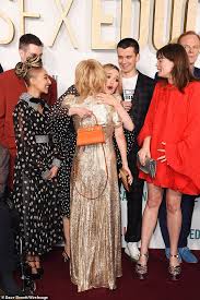 Connor swindells breaking news, photos, and videos. Gillian Anderson Dazzles In Glittering Gold Floor Length Frock For Sex Education Season Two Premiere Daily Mail Online