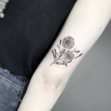 Check out some of the aster flower tattoo designs which are both beautiful and popular. Forget About Your Zodiac Sign These Gorgeous Birth Flower Tattoos Are So Much Better Birth Flower Tattoos Half Sleeve Tattoos Drawings Flower Tattoo