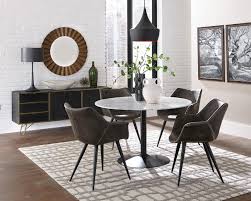 This set includes everything you need to start planning a new design, including a rectangular table and four matching chairs. Bartole Marble Top Dining Table With Metal Base