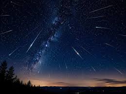 The Lyrid Meteor Shower 2026 streaking across the night sky near the constellation Lyra