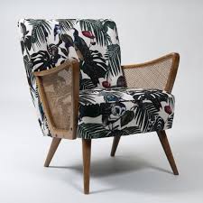 Retro Scandinavian Chair Upholstered In Amazonia Light Fabric By Witch And Watchman Featuring Tropical Palm Leaves Colourful Cushions Upholstery Cushion Design