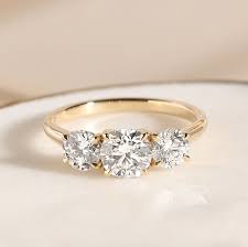 Three Round Diamonds Engagement Ring In Yellow Gold Gold Band Engagement Rings Pretty Engagement Rings Engagement Rings Round Gold