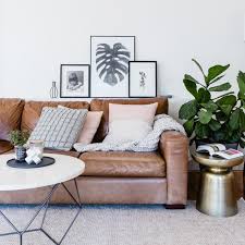 Living room with leather couch. Design Recommendation A Classic Brown Leather Sofa