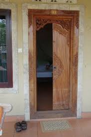 From there, you can have your wood door carved to look unique and beautiful. Traditional Balinese Wood Carving Around Front Door Picture Of Ani S Villas Ubud Tripadvisor