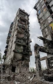 destroyed and burned houses in the city ...