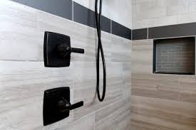 Beige Tiled Shower With Black Tile Accent Strip And Gray Tile Accent Niche Black Shower Shower Tile Gray Shower Tile