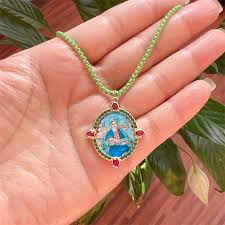 Virgin Mary Necklace in Fashion