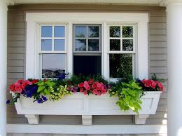Look through flower box pictures in different colors and styles and when you find some flower box that inspires you, save it to an ideabook or contact the pro who made them happen to see what kind of design ideas they have for your home. Flowering Window Box Ideas That Work For Sunny Gardens