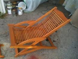 This is a great beach/lawn chair that folds up into itself. Wood Folding Teak Beach Chair Movie Prop Rentals
