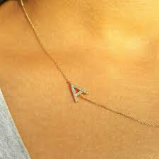 All the letters of the alphabet, distinguished by the peretti touch. Amazon Com 14k Solid Gold Diamond Initial Necklace Custom Sideways Personalized Diamond Letter Necklace Pave Setting Alphabet Letter Charm Necklace Great Gift For Her Birthday Christmas Gift Jewee Diamond Handmade