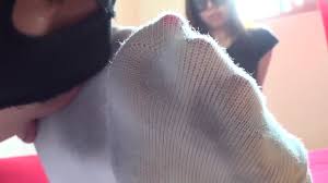 Korean teenage girl getting her dirty socks licked out by her kinky male  foot slave