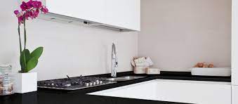 Howdens complete white gloss handless kitchen + some appliances quartz worktops. Black And White Kitchens In Natural Stone A Timeless Trend Cupa Stone