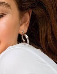 Maybe you would like to learn more about one of these? Sterling Silver Thick Hoop Earrings