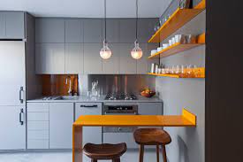 10 pretty kitchen color schemes. A Micro Apartment With A Grey And Yellow Color Palette Micro Apartment Color Palette Yellow Yellow Kitchen Designs
