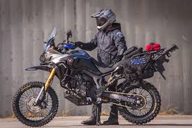 Mar 90 africa twin, paris dakar replica based on the transalp, but fitted with a larger capacity 6 valve engine,twin round headlights fitted into the fairing, handguards fitted to the handgrips and a large. Meet The Africa Twin Police Bike Build By Roland Sands Adv Pulse