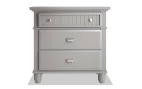 Cool metal handles protect a pair of drawers durable enough to carry 22 lbs. Spencer Gray Nightstand Bob S Discount Furniture