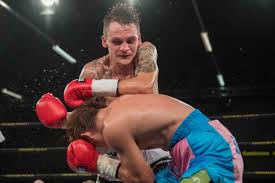 Hekkie Budler survives knockdown to make boxing history